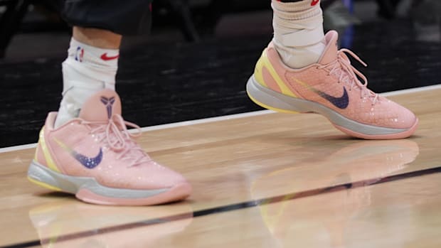 Josh Giddey's pink Nike Kobe sneakers.