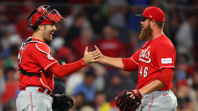 Cincinnati Reds catcher Curt Casali and pitcher Buck Farmer