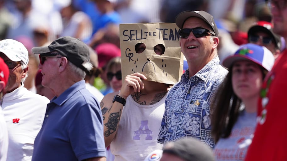 This poor Rockies fan has witnessed the worst 50-game start in the MLB's modern era.  | Ron Chenoy-Imagn Images