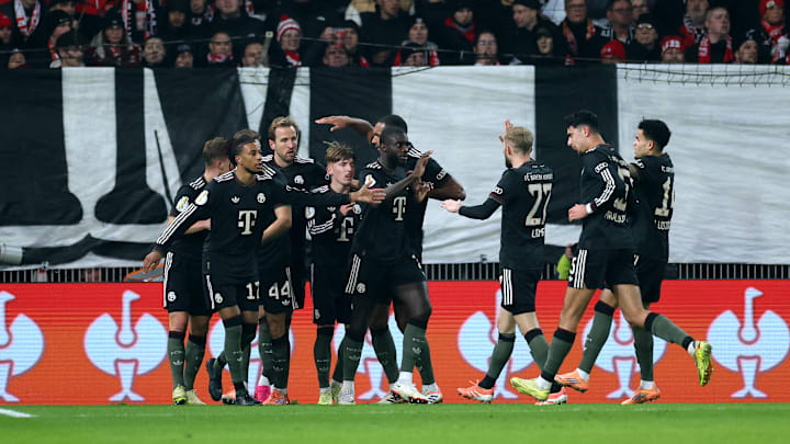 Bayern Munich players celebrating against Union Berlin in the DFB Pokal.