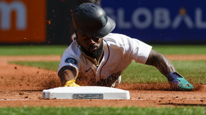 Seattle Mariners left fielder Randy Arozarena slides into third against the Tampa Bay Rays on Wednesday at T-Mobile Park.