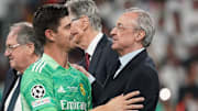 Thibaut Courtois y Florentino Perez