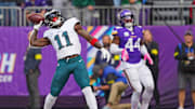 Oct 19, 2025; Minneapolis, Minnesota, USA; Philadelphia Eagles wide receiver A.J. Brown (11) celebrates after a touchdown during the first half against the Minnesota Vikings at U.S. Bank Stadium. Mandatory Credit: Brad Rempel-Imagn Images