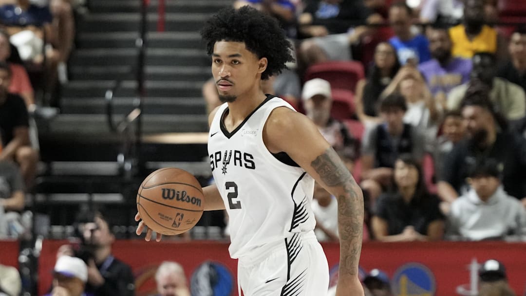 Jul 12, 2025; Las Vegas, NV, USA; San Antonio Spurs guard Dylan Harper (2) dribbles the ball against the Dallas Mavericks in the first quarter of their game at Thomas & Mack Center. Mandatory Credit: Candice Ward-Imagn Images