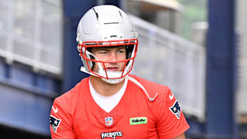 Jun 9, 2025; Foxborough, MA, USA; New England Patriots quarterback Drake Maye (10) and safety Kyle Dugger (23) walk to the practice fields at Gillette Stadium. Mandatory Credit: Eric Canha-Imagn Images