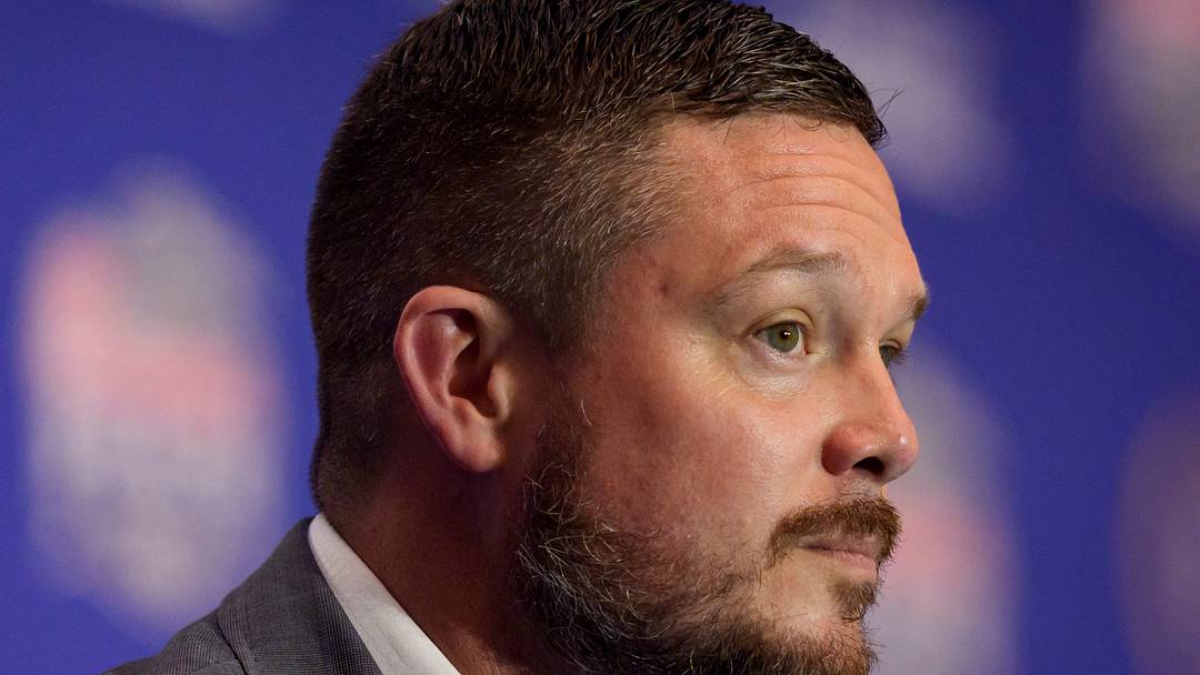 Oregon head coach Dan Lanning listens to a reporter’s question during the head coaches’ press conference ahead of the Peach Bowl at the College Football Hall of Fame in Atlanta, Georgia, on Jan. 8, 2026.
