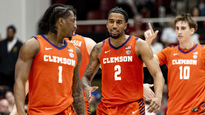 Feb 4, 2026; Stanford, California, USA;  Clemson Tigers guard Jestin Porter (1), guard Dillon Hunter (2) and forward Jake Wahlin (10) react during the second half against the Stanford Cardinal at Maples Pavilion. Mandatory Credit: John Hefti-Imagn Images