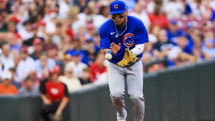 Jul 30, 2024; Cincinnati, Ohio, USA; Chicago Cubs third baseman Isaac Paredes (17) grounds the ball hit by Cincinnati Reds third baseman Noelvi Marte (not pictured) in the third inning at Great American Ball Park.