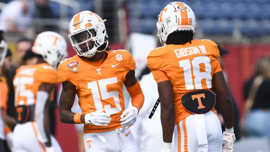 Tennessee defensive backs Cristian Conyer (15) and Rickey Gibson III (18) are warming up for the Citrus Bowl NCAA College football game on Monday, January 1, 2024, in Orlando, Fla.