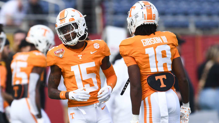 Tennessee defensive backs Cristian Conyer (15) and Rickey Gibson III (18) warming up for the Citrus Bowl NCAA College football game on Monday, January 1, 2024 in Orlando, Fla.