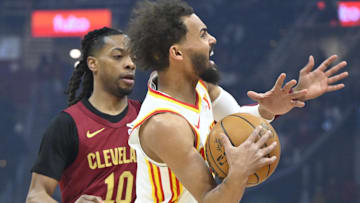 Trae Young #1 of the Atlanta Hawks reacts against the Cleveland Cavaliers.