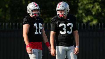 Ohio State Buckeyes quarterback Devin Brown (33) and quarterback Will Howard (18)