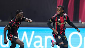 Feb 22, 2025; Atlanta, Georgia, USA; Atlanta United forward Edwin Mosquera (70) celebrates with forward Emmanuel Latte Lath (19) after a goal against CF Montreal in the second half at Mercedes-Benz Stadium. Mandatory Credit: Brett Davis-Imagn Images
