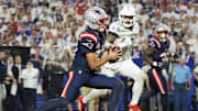 Oct 5, 2025; Orchard Park, New York, USA; New England Patriots quarterback Drake Maye (10) rushes the ball against the Buffalo Bills during the first half at Highmark Stadium. Mandatory Credit: Gregory Fisher-Imagn Images