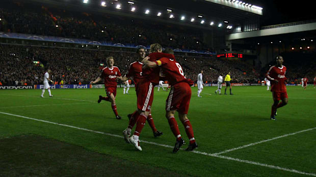 Liverpool players celebrate against Real Madrid in 2009