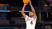 Mar 12, 2025; Indianapolis, IN, USA;  Rutgers Scarlet Knights guard Ace Bailey (4) shoots the ball in the second half against the USC Trojans at Gainbridge Fieldhouse. Mandatory Credit: Trevor Ruszkowski-Imagn Images