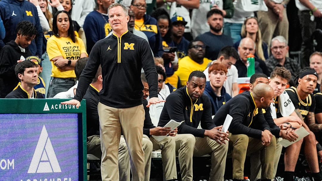 Michigan head coach Dusty May reacts to a play against Michigan State during the first half at Breslin Center in East Lansing on Sunday, March 9, 2025.