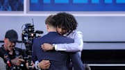 Jun 25, 2025; Brooklyn, NY, USA;  Cooper Flagg embraces Asa Newell after being selected as first overall by the Dallas Mavericks in the first round of the 2025 NBA Draft at Barclays Center. Mandatory Credit: Brad Penner-Imagn Images