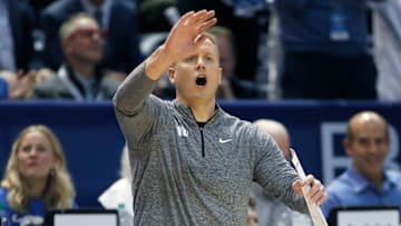 Kevin Young calls out to his team as they face Arizona.