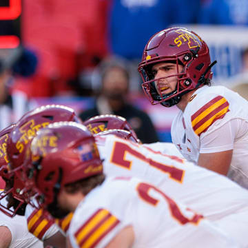Nov 9, 2024; Kansas City, Missouri, USA; Iowa State Cyclones quarterback Rocco Becht (3) behind the line during the first quarter against the Kansas Jayhawks at GEHA Field at Arrowhead Stadium. Mandatory Credit: William Purnell-Imagn Images