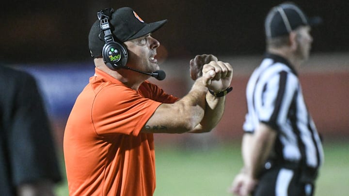 Cocoa defensive coordinator Matt Diesel sets the defense during the game against Dunnellon in the FHSAA football playoffs Friday, November 17, 2023. Craig Bailey/FLORIDA TODAY via USA TODAY NETWORK