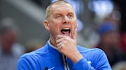 Kentucky Wildcats head coach Mark Pope watches as the Cards go up on Kentucky in the first half during the UofL-UK annual rivalry game at the KFC Yum! Center in Louisville, Kentucky Nov. 11, 2025.