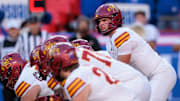 Nov 9, 2024; Kansas City, Missouri, USA; Iowa State Cyclones quarterback Rocco Becht (3) behind the line during the first quarter against the Kansas Jayhawks at GEHA Field at Arrowhead Stadium. Mandatory Credit: William Purnell-Imagn Images