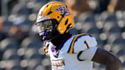 Dec 6, 2024; Birmingham, AL, USA; Jackson's Landon Duckworth (1) looks to the sidelines for a play during the game with Cherokee County at Protective Stadium in the AHSAA 4A State Championship game.