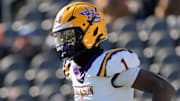 Dec 6, 2024; Birmingham, AL, USA; Jackson's Landon Duckworth (1) looks to the sidelines for a play during the game with Cherokee County at Protective Stadium in the AHSAA 4A State Championship game.