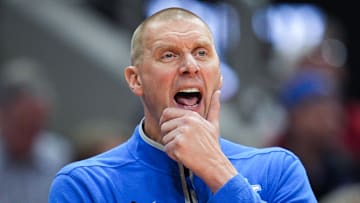 Kentucky Wildcats head coach Mark Pope watches as the Cards go up on Kentucky in the first half during the UofL-UK annual rivalry game at the KFC Yum! Center in Louisville, Kentucky Nov. 11, 2025.