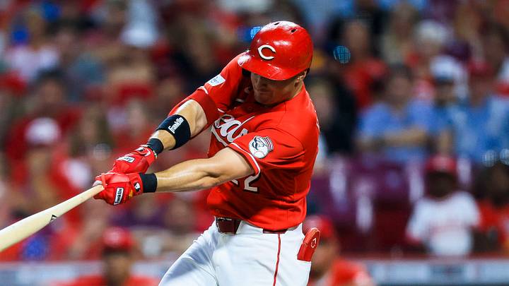 Jul 9, 2026; Cincinnati, Ohio, USA; Cincinnati Reds outfielder JJ Bleday (22) hits a single in the ninth inning against the Philadelphia Phillies at Great American Ball Park. Mandatory Credit: Katie Stratman-Imagn Images