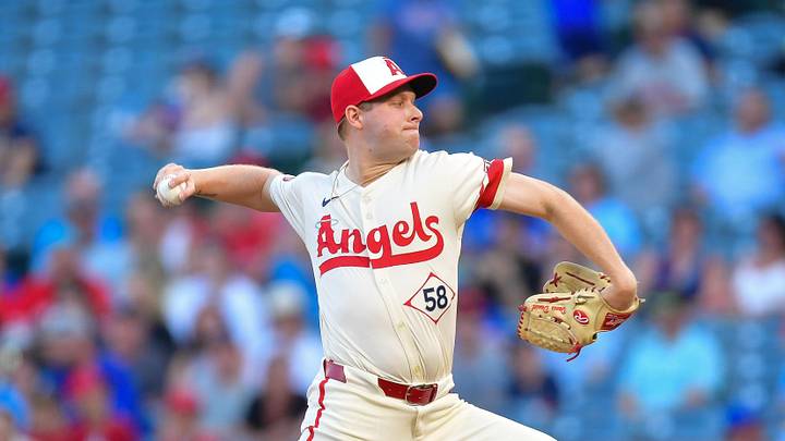 Aug 12, 2024; Anaheim, California, USA; Los Angeles Angels pitcher Davis Daniel (58) throws against the Toronto Blue Jays during the first inning at Angel Stadium. Mandatory Credit: Gary A. Vasquez-Imagn Images