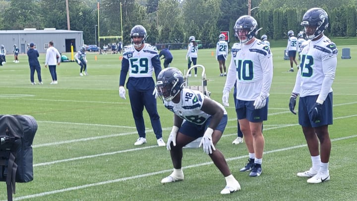 Seahawks rookie linebacker Tyrice Knight prepares for a sled shed drill during Wednesday's OTA practice.