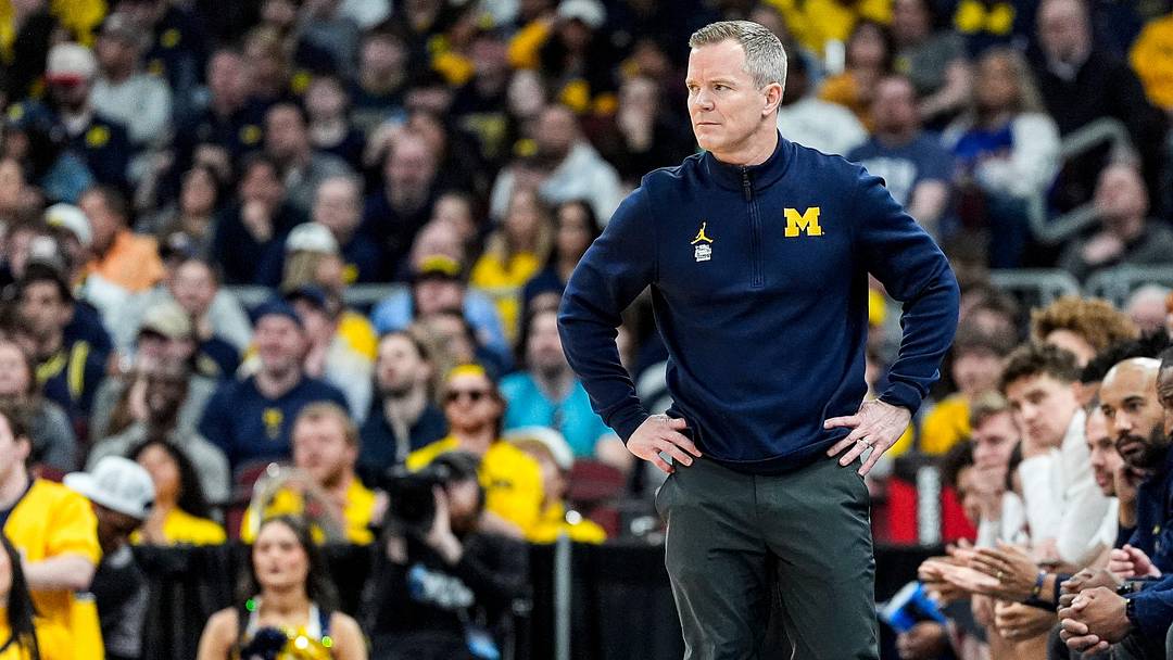 Michigan head coach Dusty May watches a play against Tennessee during the first half of NCAA Tournament Elite 8 round at United Center in Chicago on Sunday, March 29, 2026.