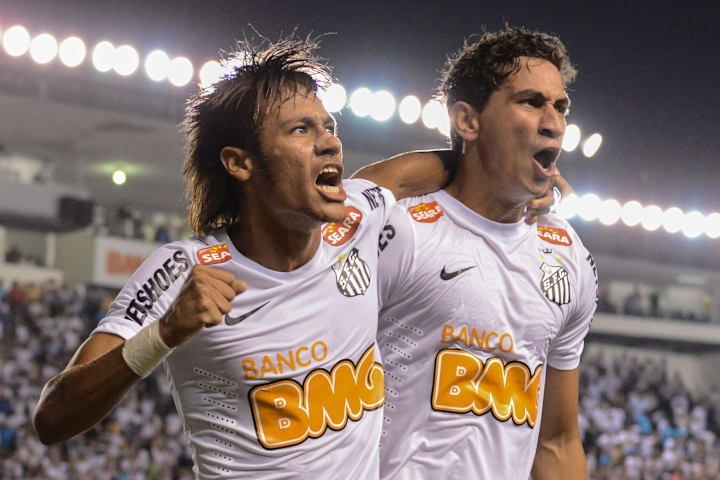 Footballer Neymar (L), of Brazilian team