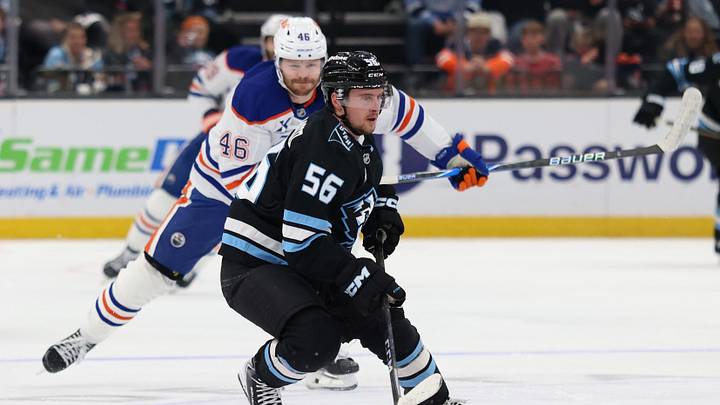 Apr 7, 2026; Salt Lake City, Utah, USA; Utah Mammoth right wing Kailer Yamamoto (56) skates with the puck against the Edmonton Oilers during the third period at Delta Center. Mandatory Credit: Rob Gray-Imagn Images