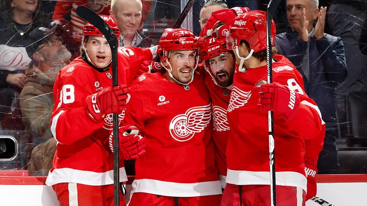 Apr 7, 2026; Detroit, Michigan, USA;  Detroit Red Wings defenseman Justin Faulk (72) receives congratulations from teammates after scoring in the second period against the Columbus Blue Jackets at Little Caesars Arena. Mandatory Credit: Rick Osentoski-Imagn Images