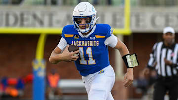 SDSU   s Mark Gronowski (11) runs with the ball during a game against Missouri State on Saturday, Nov. 18, 2023 at Dana J. Dykhouse Stadium in Brookings, South Dakota.
