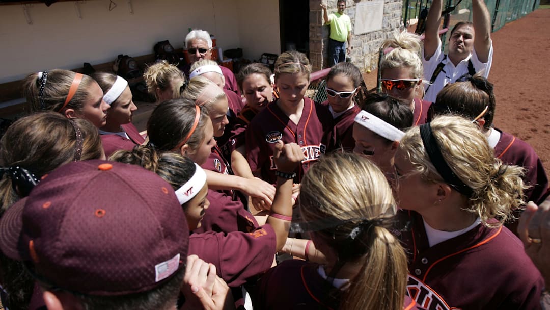 April 21, 2007; Blacksburg, VA, USA; Players on the Virginia Tech Hokies softball team huddle together before the start of the game against the Maryland Terrapins at Tech Softball Park in Blacksburg, VA.  This was the first home softball game for Virginia Tech since the since the shootings occurred on April 16, 2007, which claimed the lives of 32 victims.  Virginia Tech defeated Maryland 5-4 in the first game of a doubleheader.  Mandatory Credit: James Lang-Imagn Images Copyright © James Lang
