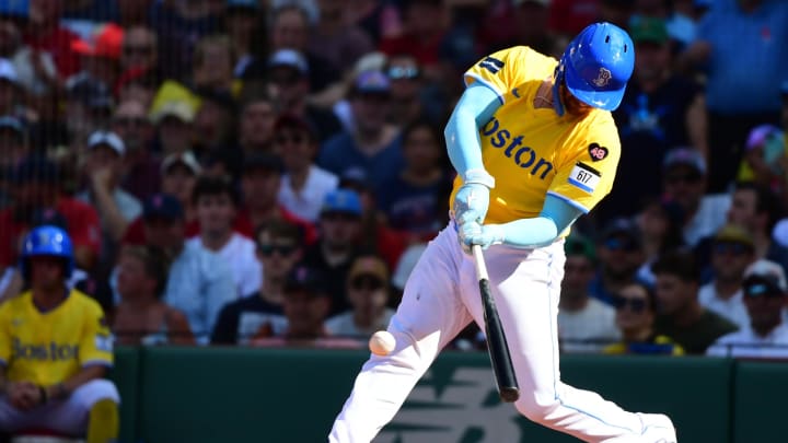 Jul 13, 2024; Boston, Massachusetts, USA;  Boston Red Sox catcher Reese McGuire (3) hits an RBI double during the second inning at Fenway Park. Mandatory Credit: Bob DeChiara-USA TODAY Sports