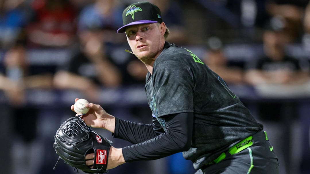 Jul 22, 2025; Tampa, Florida, USA; Tampa Bay Rays pitcher Pete Fairbanks (29) throws to first for an out against the Chicago White Sox in the ninth inning at George M. Steinbrenner Field.
