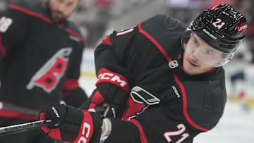 May 28, 2025; Raleigh, North Carolina, USA; Carolina Hurricanes defenseman Alexander Nikishin (21) warms up prior to the game against the Florida Panthers in game five of the Eastern Conference Final of the 2025 Stanley Cup Playoffs at Lenovo Center. Mandatory Credit: James Guillory-Imagn Images