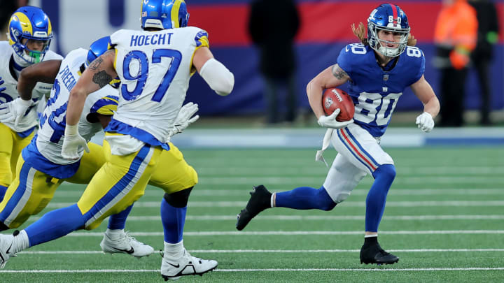 Dec 31, 2023; East Rutherford, New Jersey, USA; New York Giants wide receiver Gunner Olszewski (80) returns a punt against Los Angeles Rams linebacker Michael Hoecht (97) and running back Royce Freeman (24) during the fourth quarter at MetLife Stadium.  