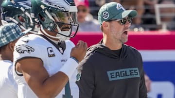 Philadelphia Eagles quarterback Jalen Hurts (1) and head coach Nick Sirianni pregame against the New York Giants at MetLife Stadium.