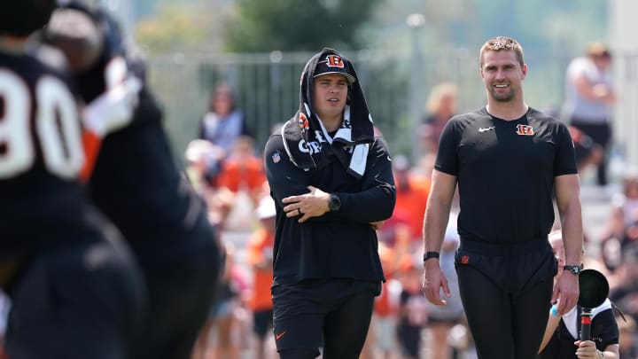 Jul 26, 2024; Cincinnati, OH, USA; Cincinnati Bengals defensive end Trey Hendrickson (left) and defensive end Sam Hubbar (right) watch play during training camp practice at Kettering Health Practice Fields. Mandatory Credit: Kareem Elgazzar-USA TODAY Sports