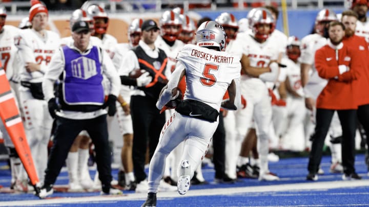 Nov 11, 2023; Boise, Idaho, USA;  New Mexico Lobos running back Jacory Croskey-Merritt (5) runs for gain during the second half at Albertsons Stadium. Boise State defeats New Mexico 42-14.