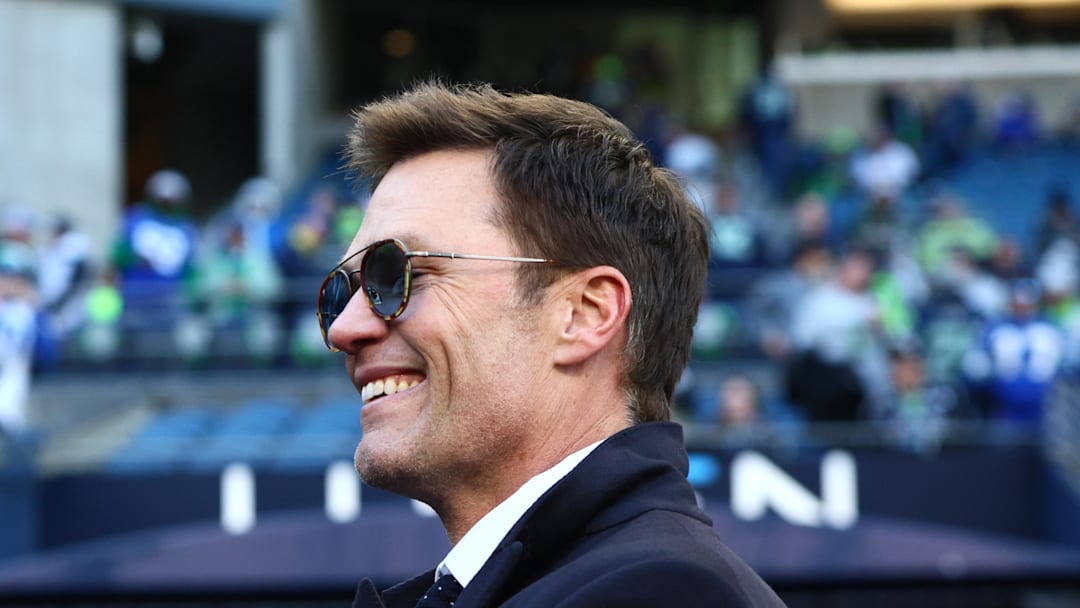 Jan 25, 2026; Seattle, WA, USA; Tom Brady signs autographs before the 2026 NFC Championship Game between the Seattle Seahawks and the Los Angeles Rams at Lumen Field. Mandatory Credit: Kevin Ng-Imagn Images