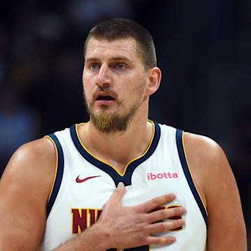 Oct 14, 2025; Denver, Colorado, USA; Denver Nuggets center Nikola Jokic (15) during the first half against the Chicago Bulls at Ball Arena. Mandatory Credit: Christopher Hanewinckel-Imagn Images