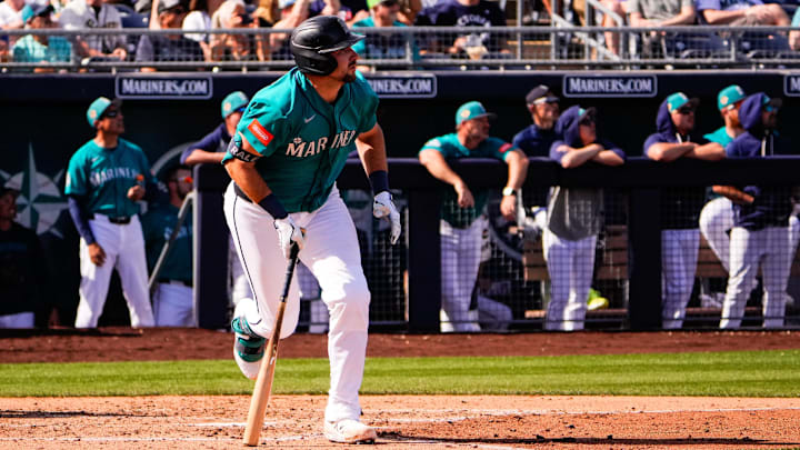 Feb 24, 2026; Peoria, Arizona, USA;  Seattle Mariners catcher Cal Raleigh (29) watches his home run during the third inning against the Chicago White Sox in Peoria, Arizona. Mandatory Credit: Arianna Grainey-Imagn Images