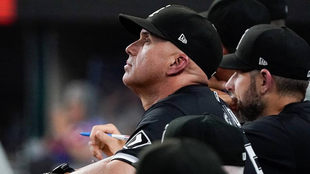 Jul 22, 2024; Arlington, Texas, USA; Chicago White Sox manager Pedro Grifol (5) looks on from the dugout during the tenth inning against the Texas Rangers at Globe Life Field. Mandatory Credit: Raymond Carlin III-Imagn Images
